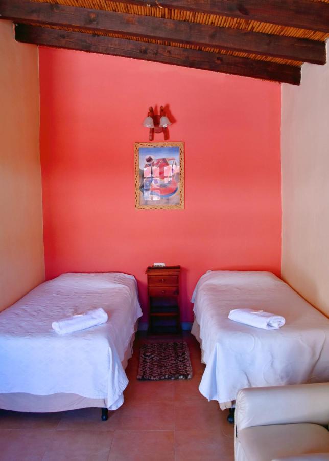 Hostal Paseo De Los Colorados プルママルカ エクステリア 写真